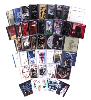 Lot of (30+) Band & Artist Signed CDs Including BB King, George Martin, Jason Aldean, Foreigner, REO Speedwagon, Boyz II Men, George Strait and Kenny Rogers (JSA Auction LOA)